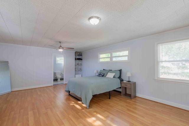 bedroom featuring ceiling fan and light wood-type flooring