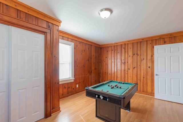 recreation room featuring wood walls, light hardwood / wood-style floors, and billiards