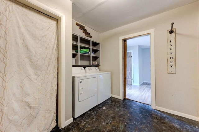 laundry area featuring washing machine and dryer