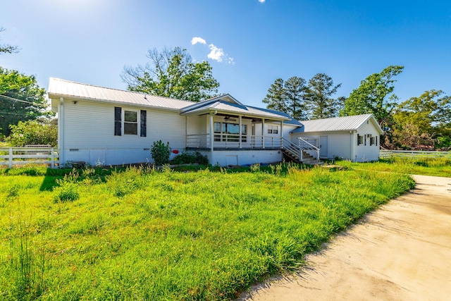 4533 Long Hollow Rd, Ringgold, GA 30736 - view of front of home with a porch, metal roof, crawl space, and stairway