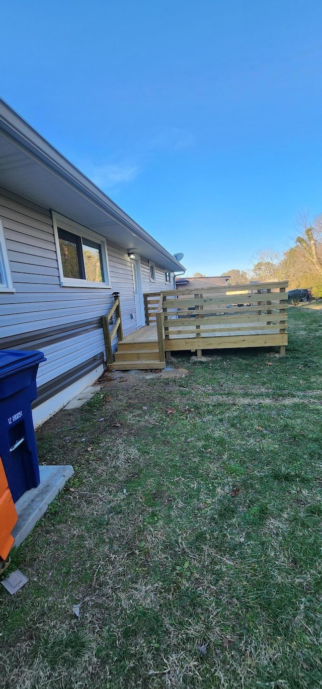 view of yard featuring a wooden deck