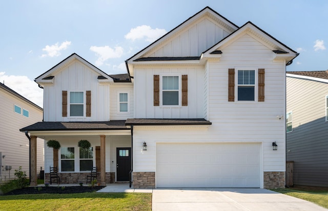 craftsman-style house with a front lawn, a porch, and a garage