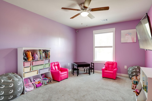 recreation room featuring ceiling fan and carpet