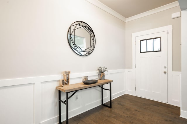 foyer entrance with crown molding and dark wood-type flooring