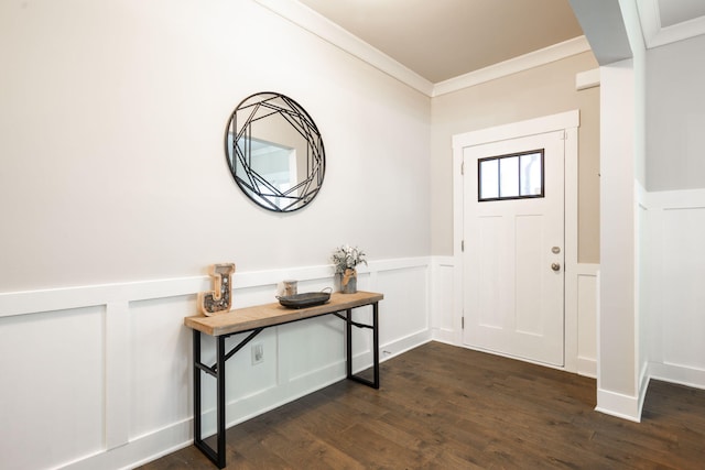 foyer featuring dark wood-type flooring and ornamental molding