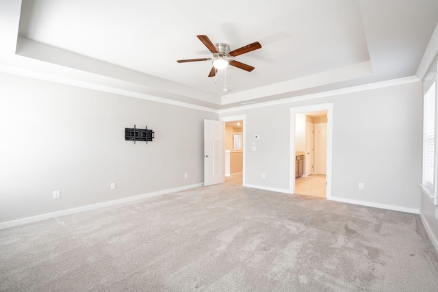 8784 Snowy Owl Rd, Ooltewah, TN 37363 - unfurnished bedroom with ceiling fan, a raised ceiling, baseboards, carpet, and ensuite bath
