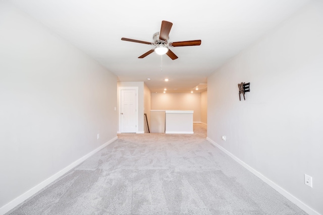 8784 Snowy Owl Rd, Ooltewah, TN 37363 - unfurnished room with baseboards, ceiling fan, and light carpet