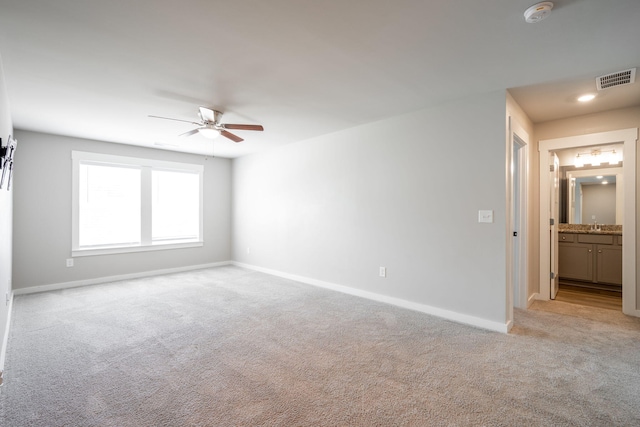 8784 Snowy Owl Rd, Ooltewah, TN 37363 - unfurnished room featuring baseboards, a ceiling fan, light colored carpet, and visible vents