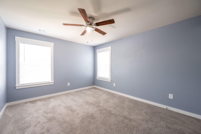 8784 Snowy Owl Rd, Ooltewah, TN 37363 - carpeted empty room featuring baseboards, ceiling fan, and visible vents