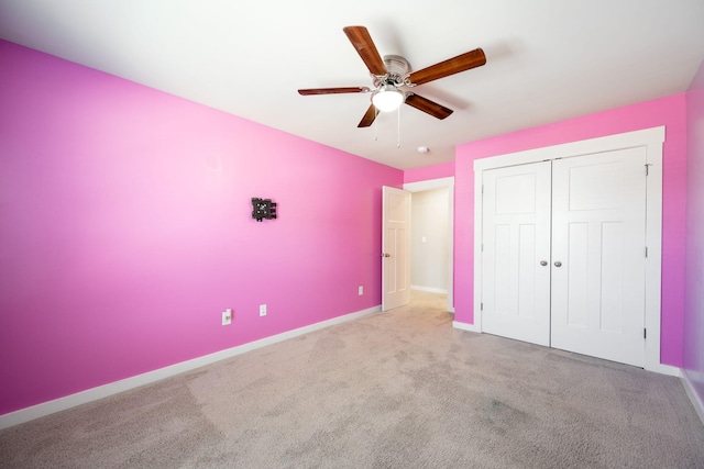 8784 Snowy Owl Rd, Ooltewah, TN 37363 - unfurnished bedroom featuring a closet, baseboards, a ceiling fan, and carpet flooring