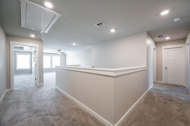 8784 Snowy Owl Rd, Ooltewah, TN 37363 - hallway with baseboards, visible vents, light carpet, and attic access