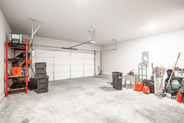8784 Snowy Owl Rd, Ooltewah, TN 37363 - garage with a garage door opener and electric panel
