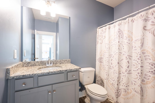 8784 Snowy Owl Rd, Ooltewah, TN 37363 - full bathroom with visible vents, a shower with curtain, toilet, and vanity