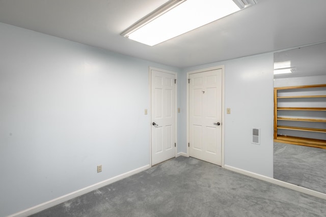 basement with carpet flooring