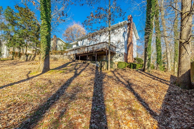 rear view of property with a deck