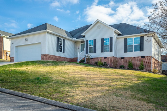 view of front of house with a garage and a front lawn