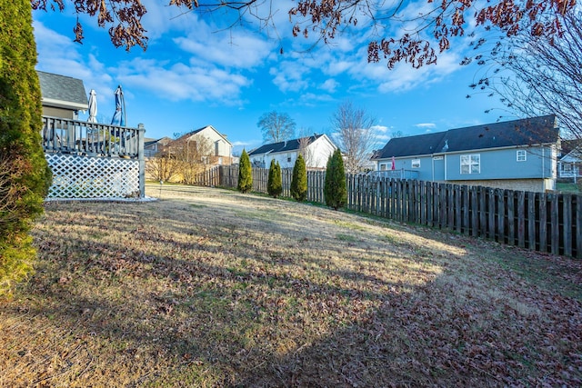 view of yard with a deck