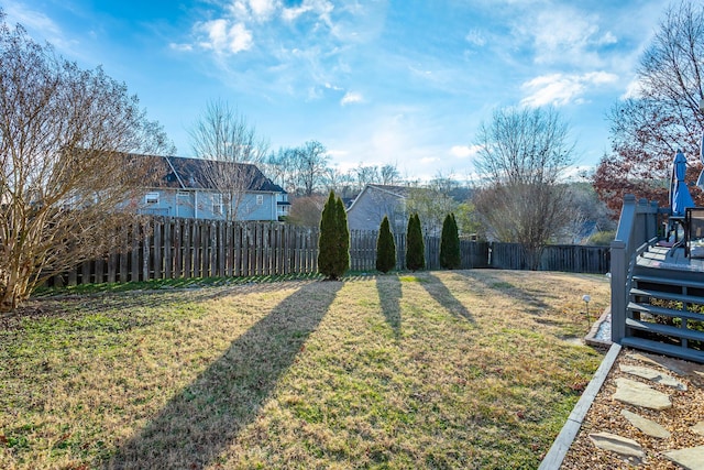 view of yard featuring a wooden deck