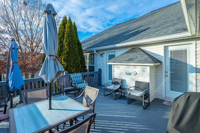 wooden terrace with area for grilling