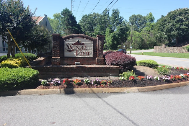 view of community sign