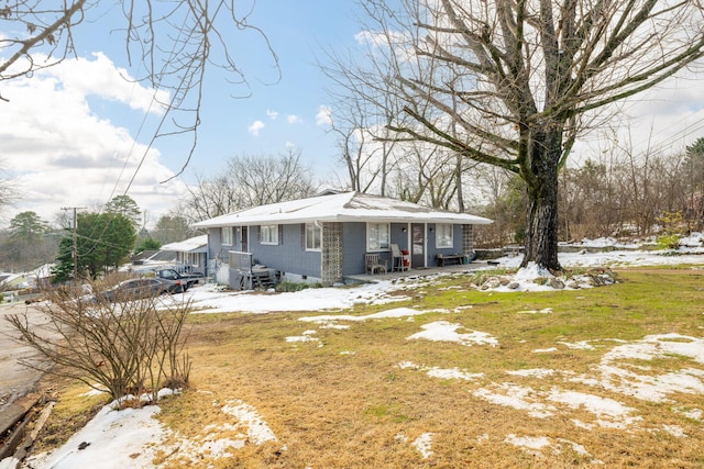 exterior space featuring a yard and a porch