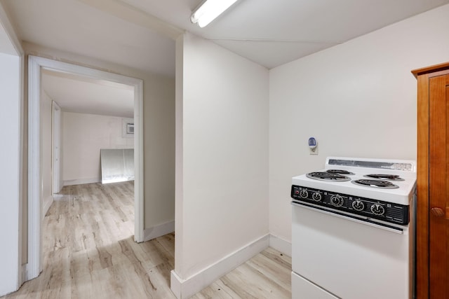 kitchen with light hardwood / wood-style floors and electric stove