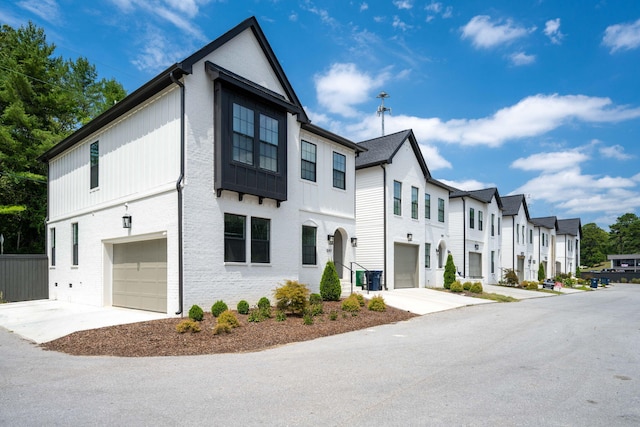 townhome / multi-family property featuring a garage