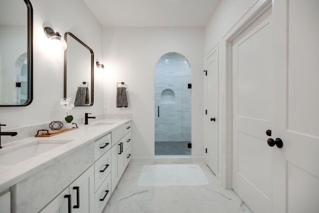 bathroom featuring vanity and walk in shower