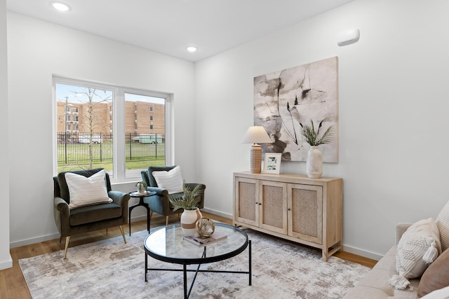 living area featuring light hardwood / wood-style floors