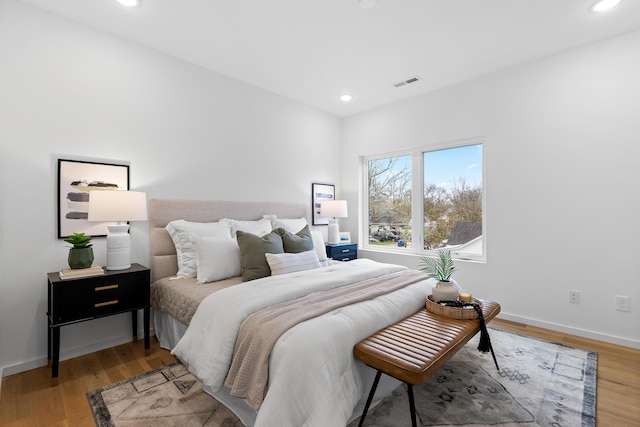 bedroom featuring hardwood / wood-style floors