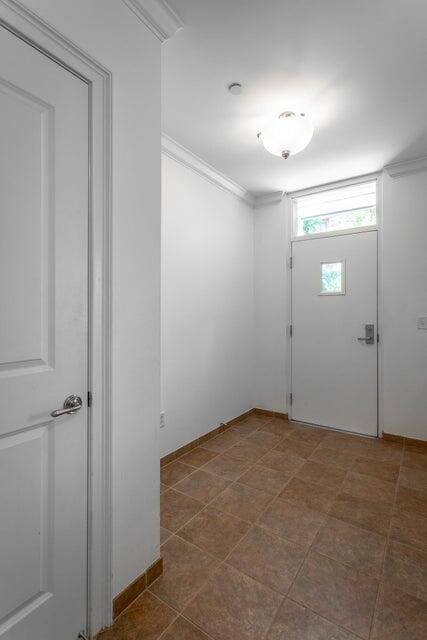 interior space featuring crown molding