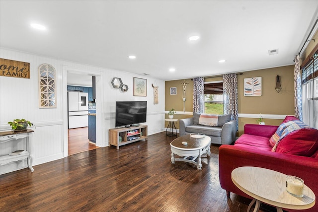 living room with dark hardwood / wood-style floors