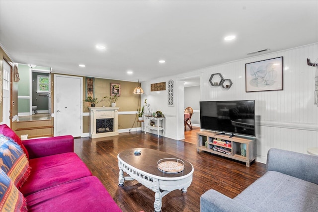 living room with dark hardwood / wood-style floors