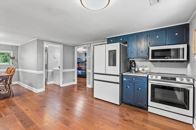 kitchen featuring blue cabinets, dark hardwood / wood-style flooring, stainless steel range with electric cooktop, and white refrigerator