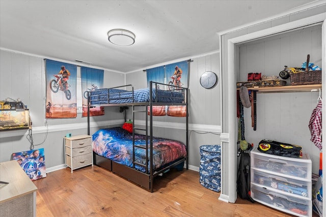 bedroom featuring hardwood / wood-style flooring