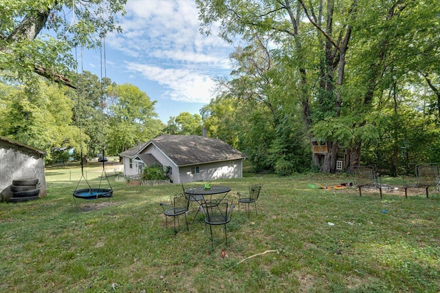 view of yard with a trampoline