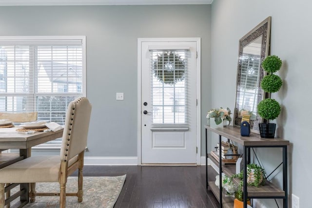 doorway to outside featuring dark hardwood / wood-style floors