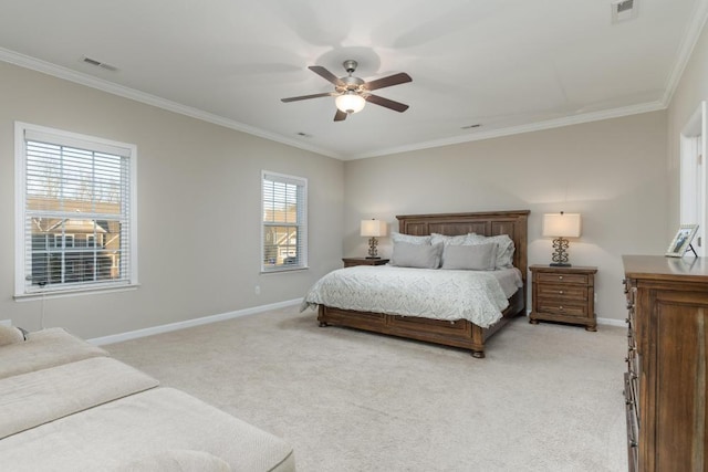 bedroom featuring ceiling fan, ornamental molding, light carpet, and multiple windows