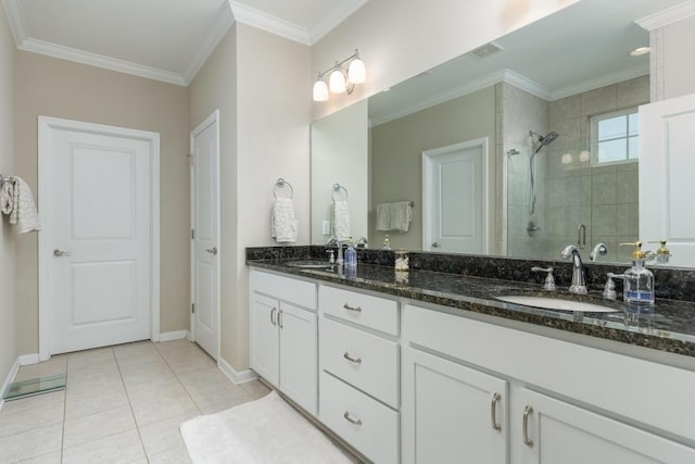 bathroom with crown molding, tile patterned flooring, vanity, and a shower with shower door