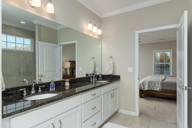 bathroom featuring tile patterned flooring, vanity, ornamental molding, and a shower with door