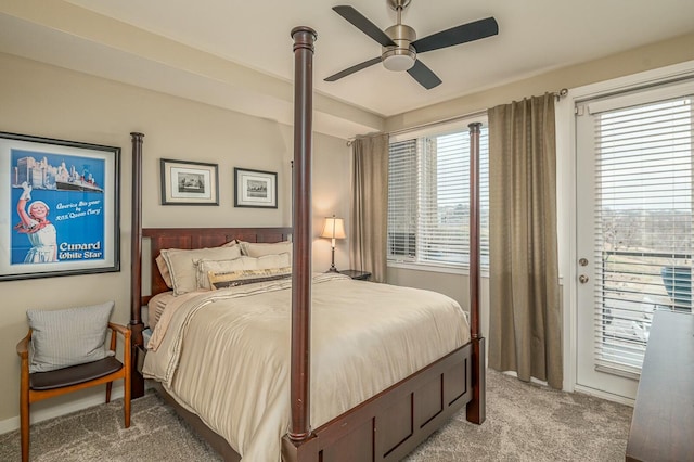 carpeted bedroom featuring ceiling fan and access to exterior