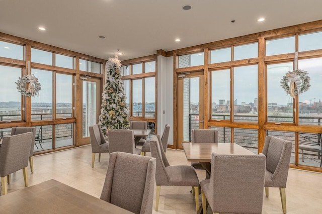 dining area with floor to ceiling windows