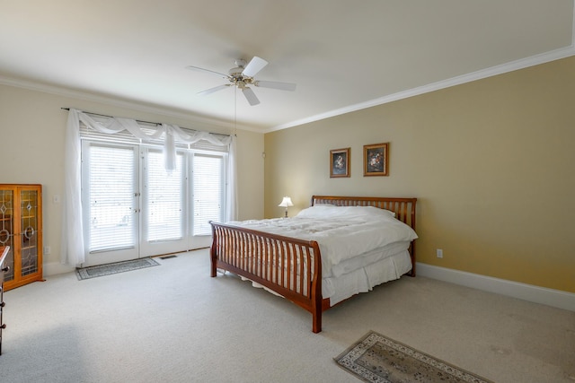 bedroom with access to outside, french doors, crown molding, ceiling fan, and light colored carpet