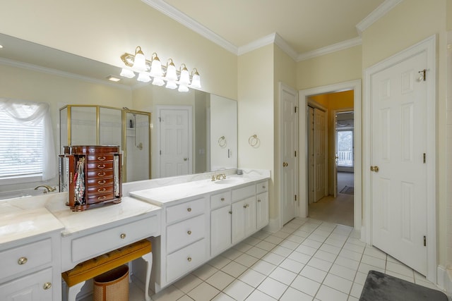 bathroom with tile patterned flooring, vanity, ornamental molding, and walk in shower