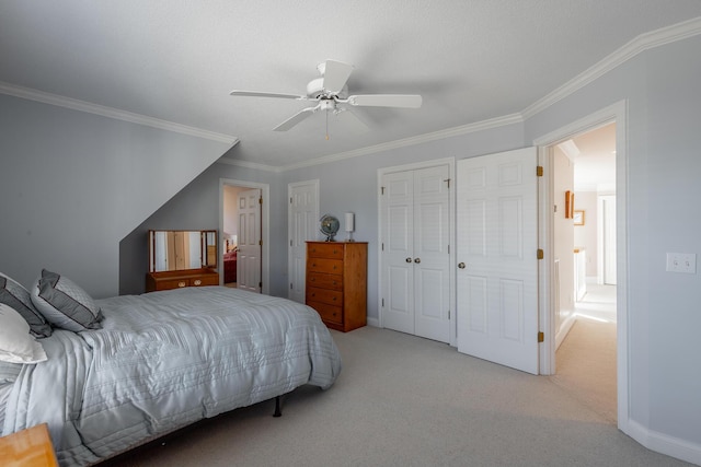 carpeted bedroom featuring ceiling fan and crown molding