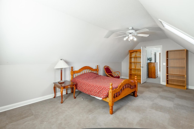 carpeted bedroom featuring vaulted ceiling and ceiling fan