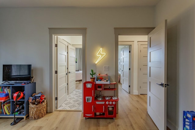 hall featuring light hardwood / wood-style flooring