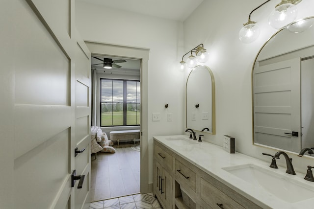 bathroom featuring vanity and ceiling fan