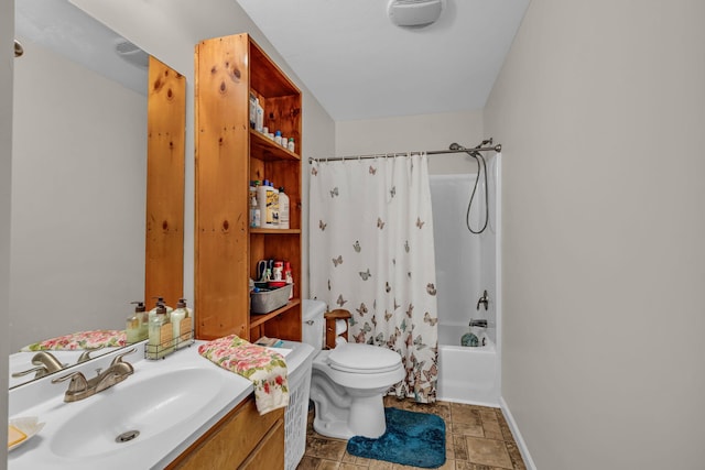 full bathroom with vanity, toilet, and shower / tub combo with curtain