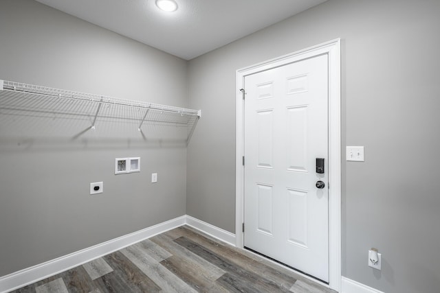 laundry room featuring electric dryer hookup, hardwood / wood-style flooring, and hookup for a washing machine